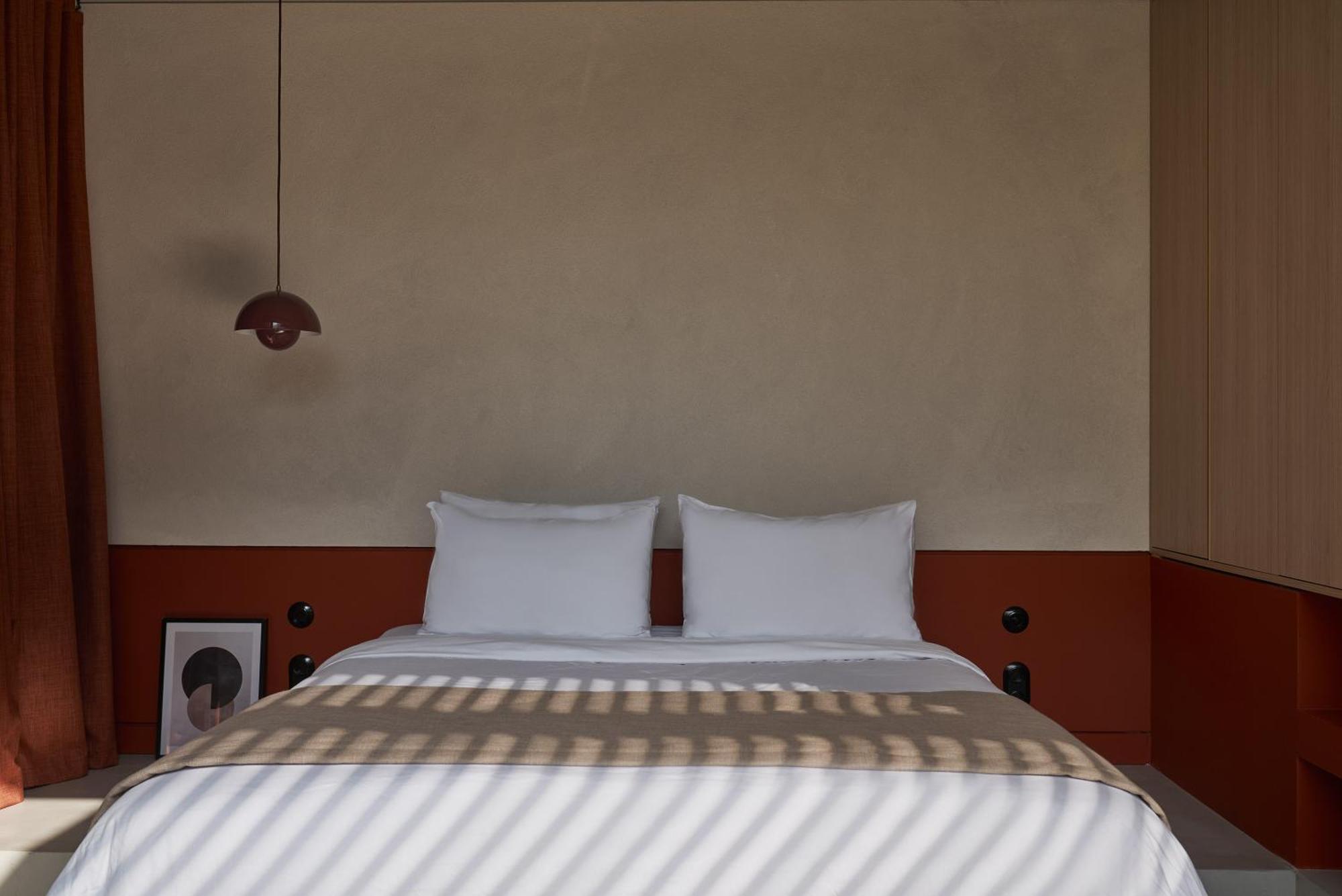 Hotel The Newel Psychiko Atenas Exterior foto A bedroom at the hotel