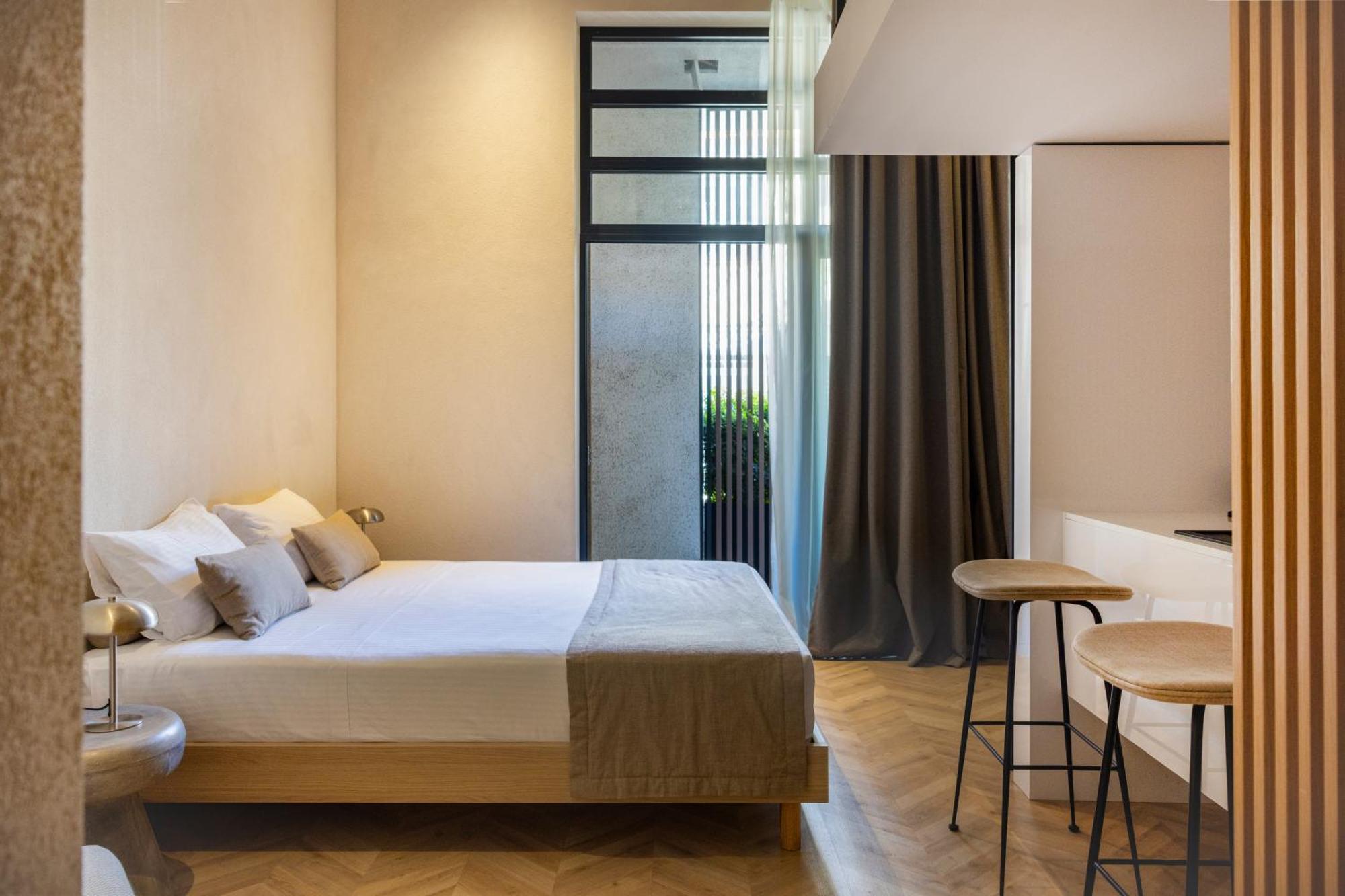 Hotel The Newel Psychiko Atenas Exterior foto A room at the hotel